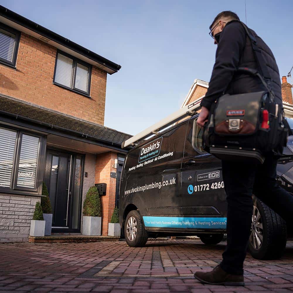 Deakins engineer visiting a local home