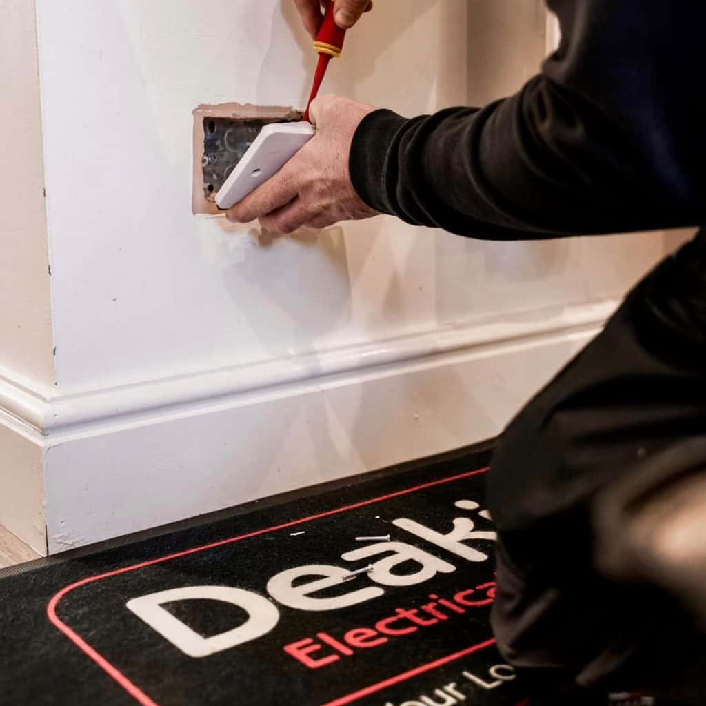 Deakins-Electrician-fixing-plug-socket