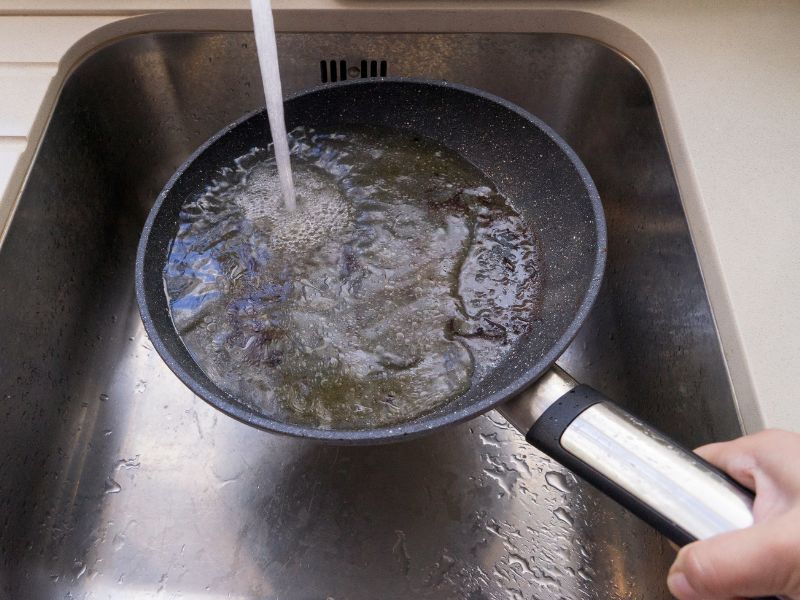 Never pour grease or oil down a sink