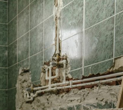 Bad bathroom pipework leaking